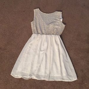 White and gold dress.