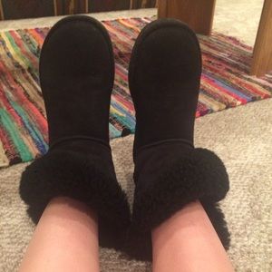 Uggs. Size 7. Black, button on the sides.