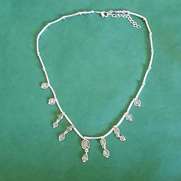 Silver necklace with green stones