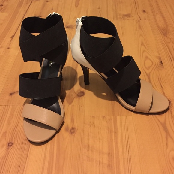 Call It Spring tan, black, and white strappy heels