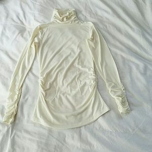 Cream Turtle neck
