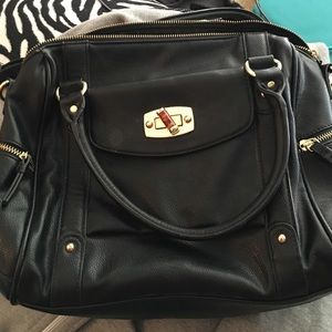 Black medium size purse with long strap