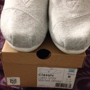 Toms worn once to try on