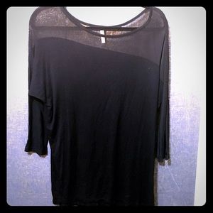 Black top with asymmetrical sheer