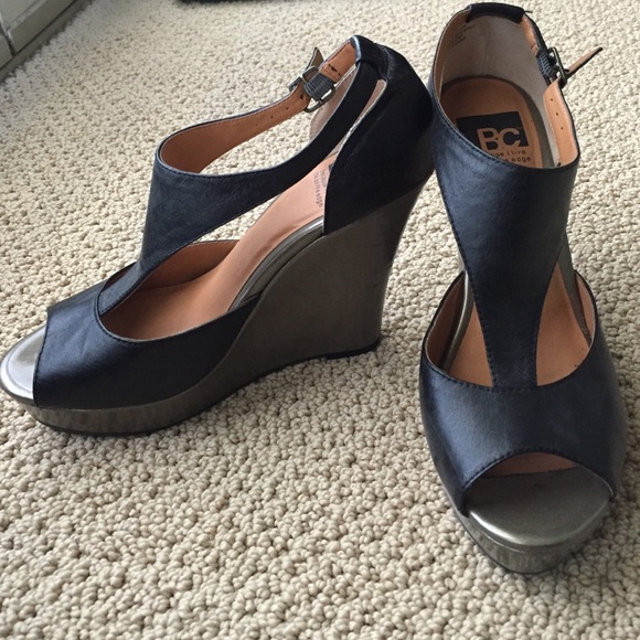 Black and gunmetal wedges with t-strap detail