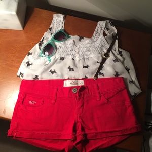 A gently used par of Red Hollister jean shorts