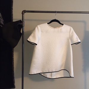 Le fou by Wilfred white top.