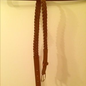 Women's braided waist belt accessory.