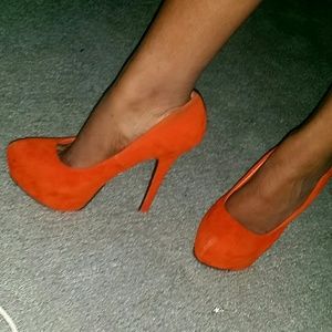 Gently used orange pumps