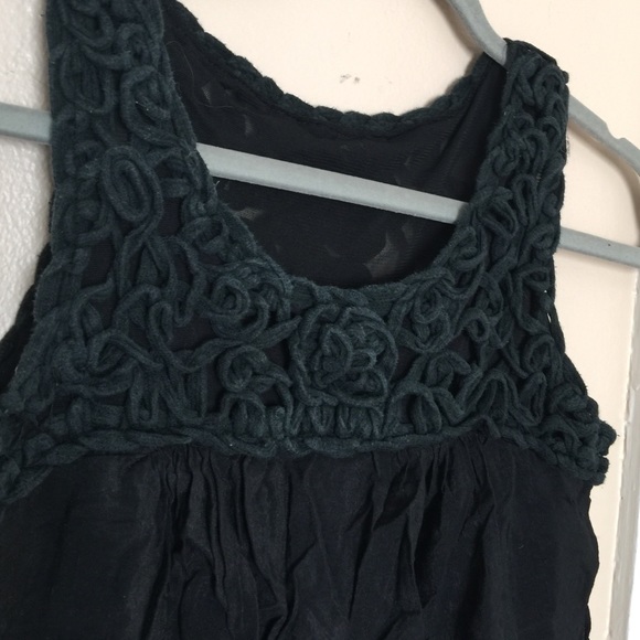 Black tuck in dress.