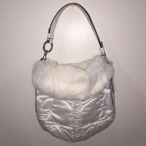 White Coach handbag lined with fur
