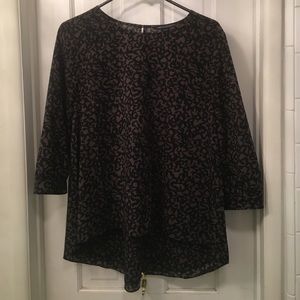 Grey and black leopard print long sleeve blouse.