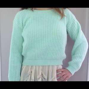 pastel green sweater