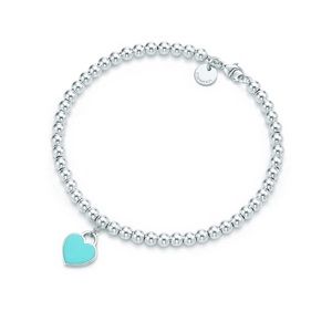 Tiffany & Co Bead Bracelet w/ Blue Heart -like new