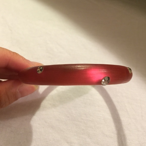 Alexis Bittar red bracelet with hints of diamonds