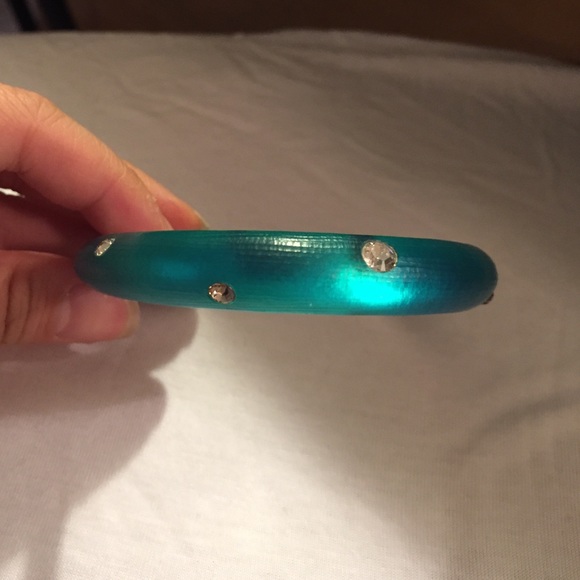 Alexis Bittar lucite bracelet in turquoise green.