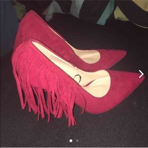 Red faux suede pumps