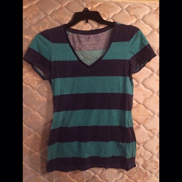 V-neck stripped shirt.