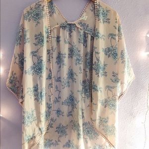 Light pink kimono with blue flowers