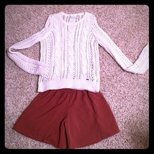 White sweater and orange culotte