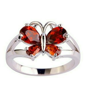 Ring, silver plated, stones garnet butterfly.