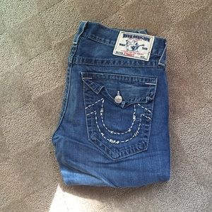 Men's True Religion jeans.