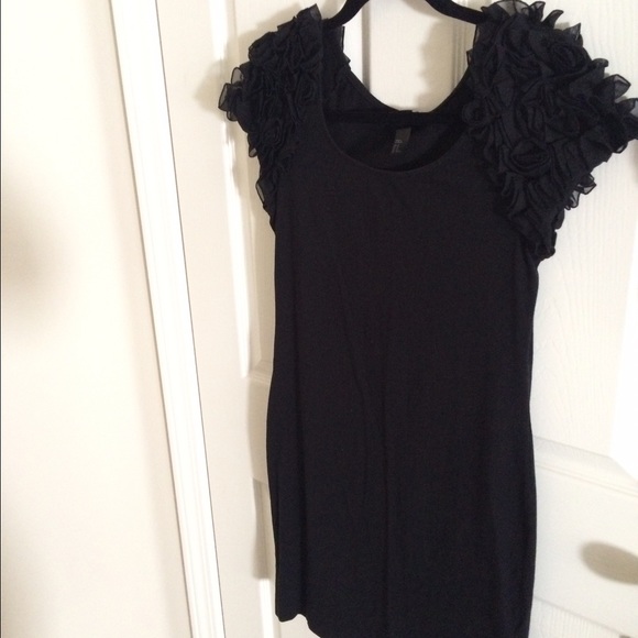 Little black dress with ruffle sleeves
