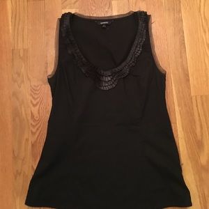 Black blouse with ruffle neckline detail