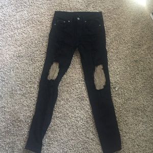 LF black jeans with tan suede rips