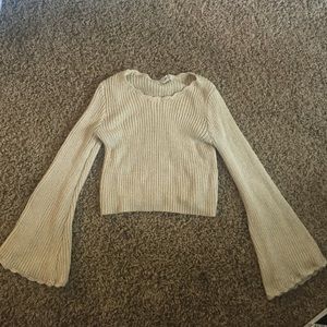 Knit sweater with bell sleeves