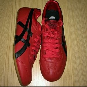 Asics women's red and black leather tennis shoes