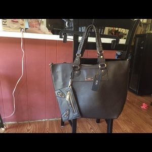 Beautiful BCBG 3 piece convertible bag with pouch!