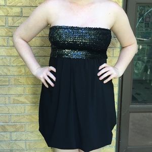 Black strapless sequin top dress.