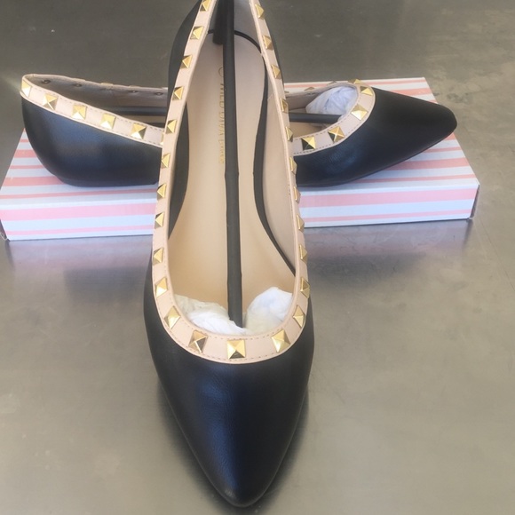 Rock studded patent leather pair
