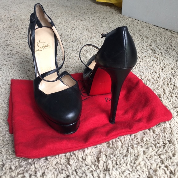 Black original Christian louboutins with dust bag