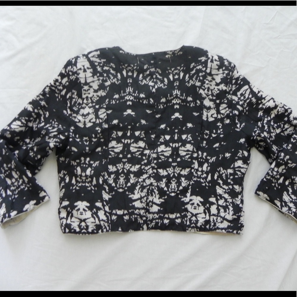 Carolina K leather triangle reversible jacket