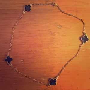 Black and gold enamel clover necklace