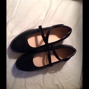 Black slip-on shoe with straps