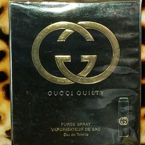 Gucci Guilty purse spray with refills. Women.
