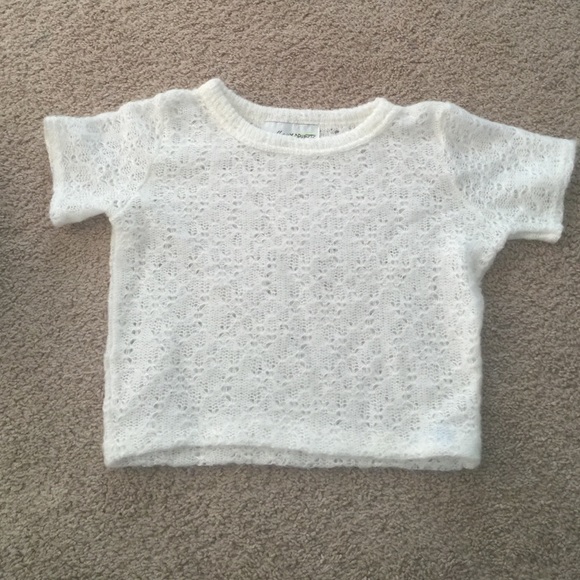 White knit style shirt.