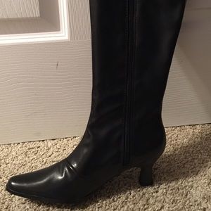 Black knee high boots.  New with tags!