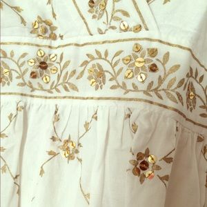 Sequined white and gold Michael Kors dress.