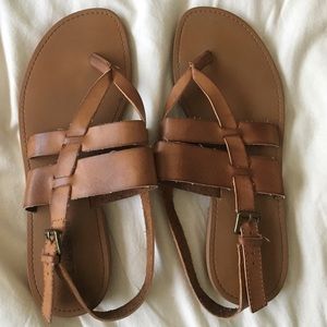 slightly worn brown sandals