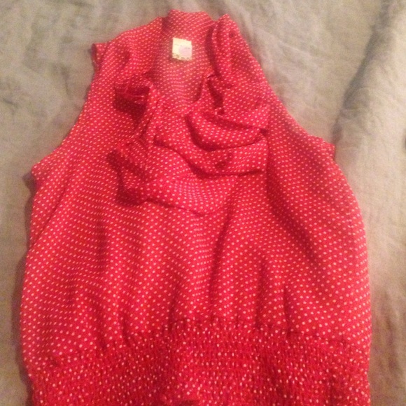 Sleeveless red and white polka dot top