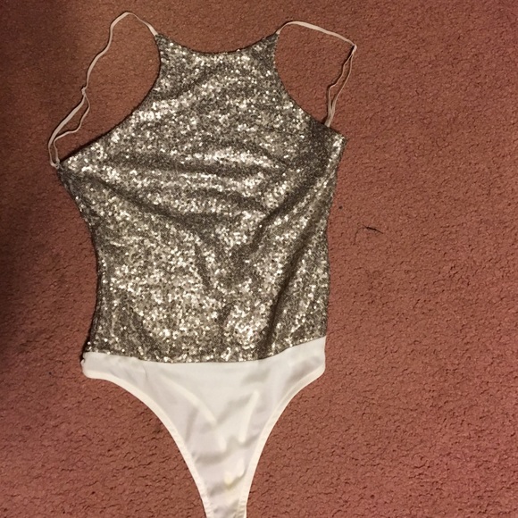 Silver and white body suit