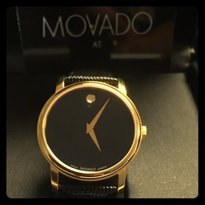 Movado yellow gold and black leather watch
