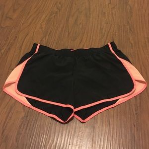 Black and pink running shorts