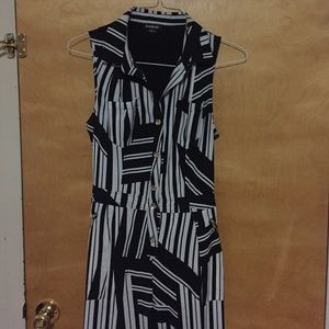 Black and white romper with back open (Used)