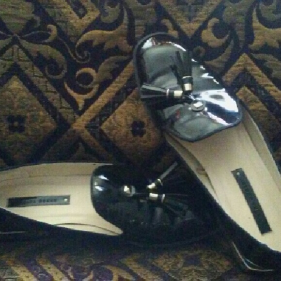 Zara's Black paten leather loafers