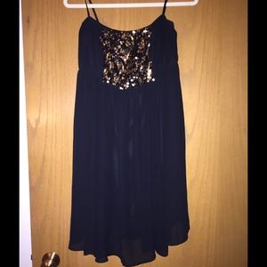 Strapless torrid black sequin dress.